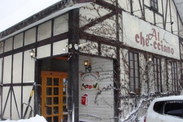 Entrance to Al-che-cciano Italian restaurant in Tsuruoka City