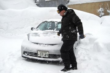 Masses of snow easily bury your car, if you are not careful