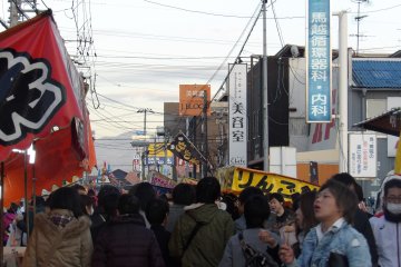 Streets surrounding the shrine are filled with hungry pedestrians