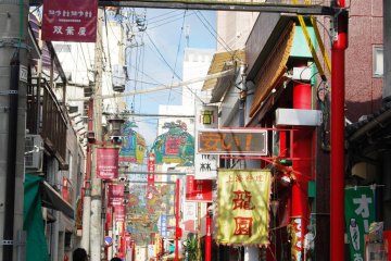 Those two guys in suit look suspicous - Chinese mafia? View of Nagasaki's Chinatown