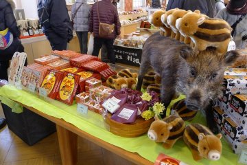 A variety of boar souvenirs are available.