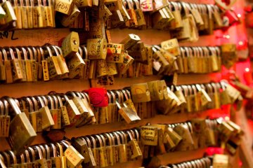 Not quite Paris, but couples leave behind locks on a wall in the Shinsekai area of Osaka.