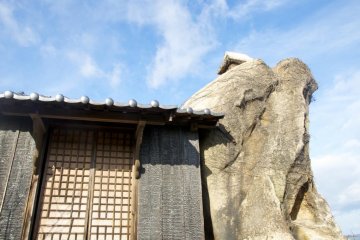 The simple shrine building is like a work of art itself.