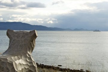 The "inu" (dog) of Inujima keeps watch.