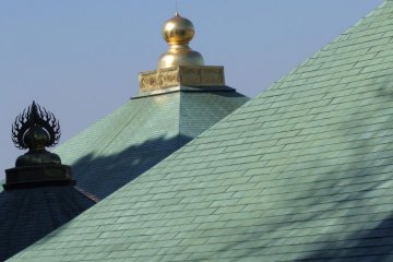 The roofs of three different buildings