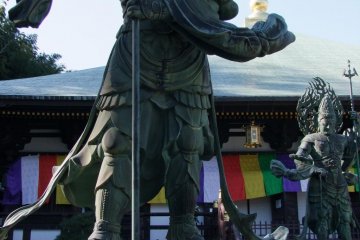 There are four statues like this here, where a god has defeated a demon