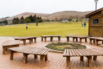 Large grassy fields at Hiraodai Countryside Park