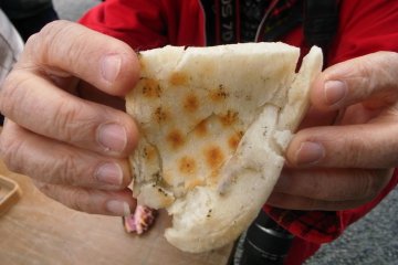 Grilled mochi is a delicious way to keep your hands warm