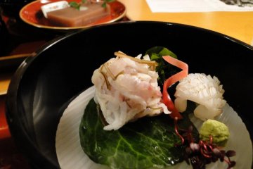 Grilled squid carefully cut into the shape of a pinecone