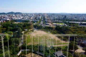 A view of the castle grounds through the glass