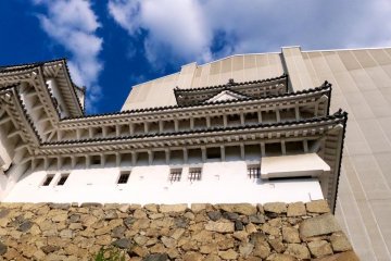 The temporary structure towers over this castle wall