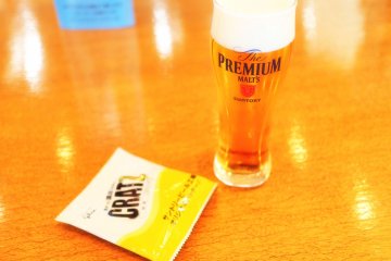 Fresh beer directly from the source is served with a salty snack