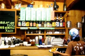 The Barakku Bistro and Izakaya in Aharen Tokashiki-son Island Okinawa has a fun cozy atmosphere and has a menu in English and Japanese