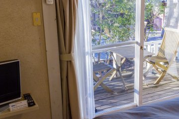 Step out of bed and onto the wooden deck