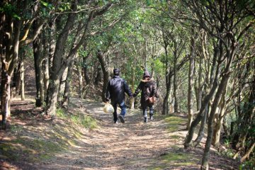 A middle-aged couple make the most of the freedom that the great outdoors allows.