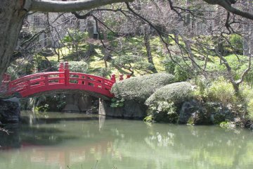 A view with a red bridge