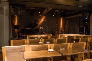 Seats lined up towards the stage inside Shinjuku Pit Inn.
