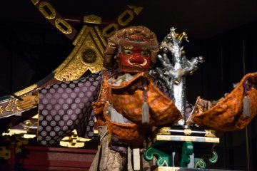 A marionette in action at the Karakuri Museum.