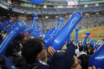 Fans getting ready for the 7th inning stretch