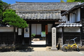 Outside his home