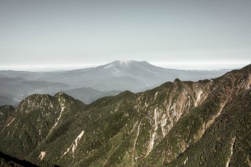 As I stopped to take a closer look, it was Mount Ontake's distinctive shape which first caught my attention