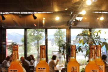 Bottles of premium quality fruit juice in the cafe shop