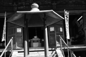 The main temple. Notice the thatched roof