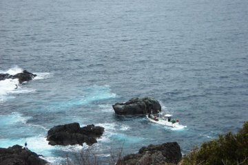 Local fishermen take people out to the rocks to spend a day fishing