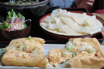 Fried tofu, flat udon and chicken broth at Nasu Tofu Chaya Restaurant 