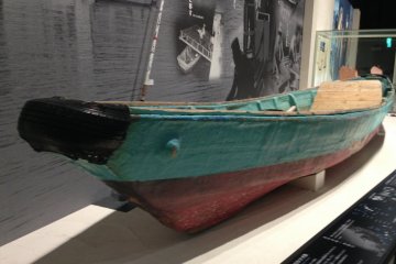 Tatana boat from Okinawa as well as Sabani boats are displayed