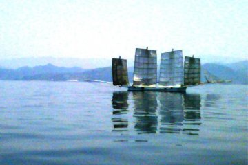 The sight of another Ukase sailing and fishing boat in the summer haze silently drifting in the still waters reminded me of a junk or the ghost of the Flying Dutchman