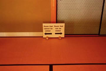 A sign in one of the teahouses points visitors in the right direction.