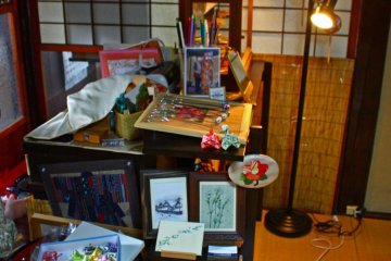 A small selection of local crafts and postcards are available to buy at the till.