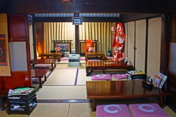 The comfortable dining area. In summer, the curtains are opened to reveal a beautiful garden.