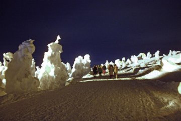During the February full moon, you can walk down from the summit of Zao, amongst the snow monsters. On a clear night, it's an amazing experience, with the lights of Yamagata City spread out below.