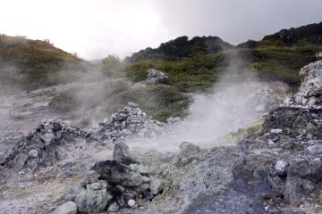 Osorezan is rich in volcanic activity, and clouds of sulphur billow eerily from the rocks. Walking around here, it's clear how it got the name 'Fear Mountain'!