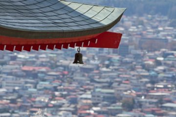 Close-up of the pagoda roof, high above the rooftops of Fujiyoshida City