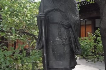A statue of a Buddhist pilgrim