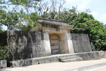 The stone gate as seen from Shuri Castle