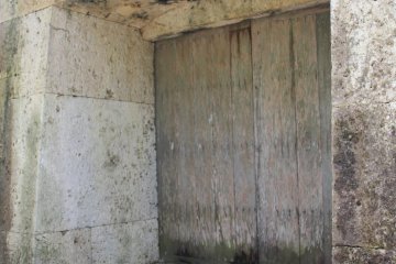 The side of the stone gate that served as entrance back into Shuri Castle