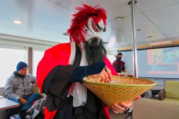 Masked Ninja handing out Ninja Biscuits 