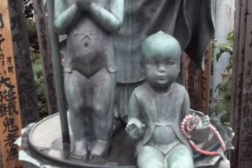 At the base of a statue