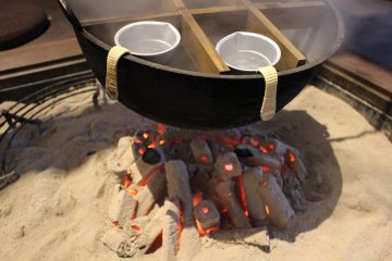 Hot sake warmed up over the 'irori' hearth