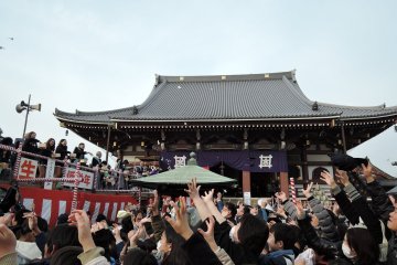 An eager crowd in front of the main building