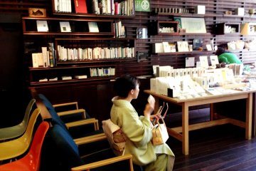 The gift shop at Iyemon Salon Cafe Karasuma Sanjo Kyoto has a visually appealing display of tea books and related accessories