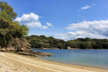 The beach below the campsite is sandy and secluded