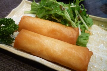Crunchy spring rolls with melted cheese inside!