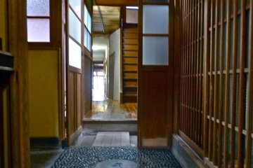 Long corridor leading to a guest room