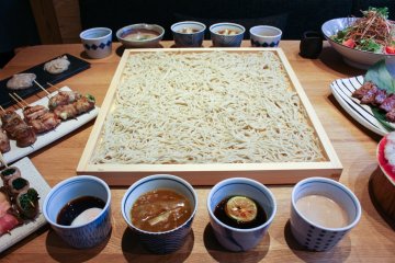 Kakomi-soba with surrounding dipping sauces (from ¥980 for 2 people) – choose from a variety of 11