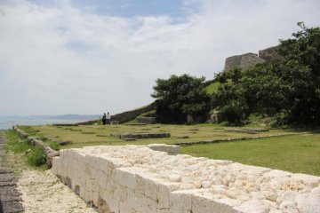 <p>White limestone atop aged and worn sections of the ruins signal that the restoration continues</p>